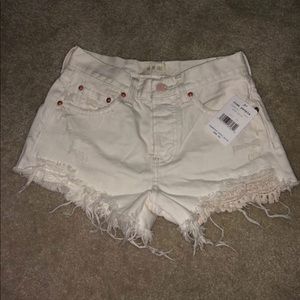 We the free distressed white shorts